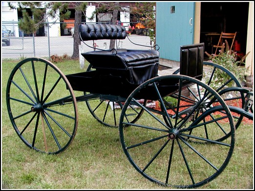 Carriage on display in front of GCHS Carriage House